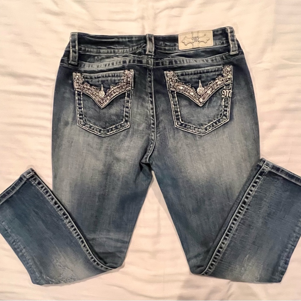 Cropped super cute Miss Me jeans with bling on front and back.